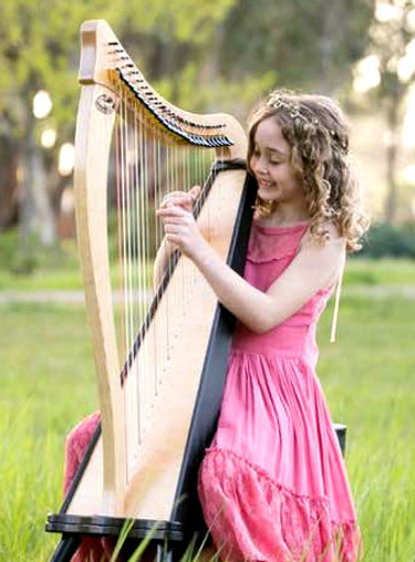 Girl plays harp